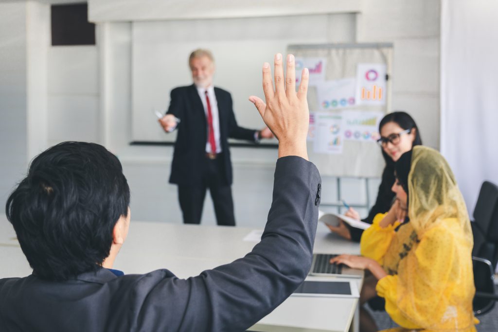 executive leadership training class with teacher and students